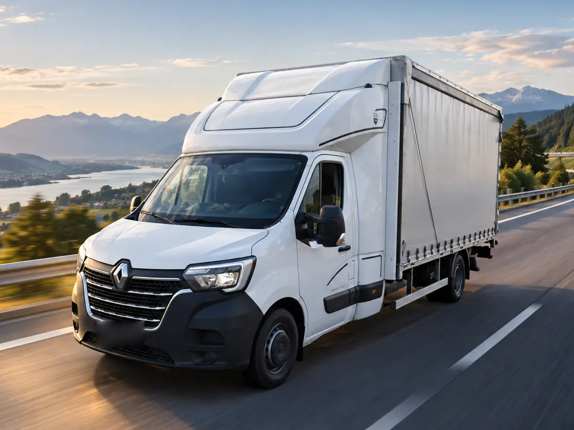 Curtainsider van on the road.